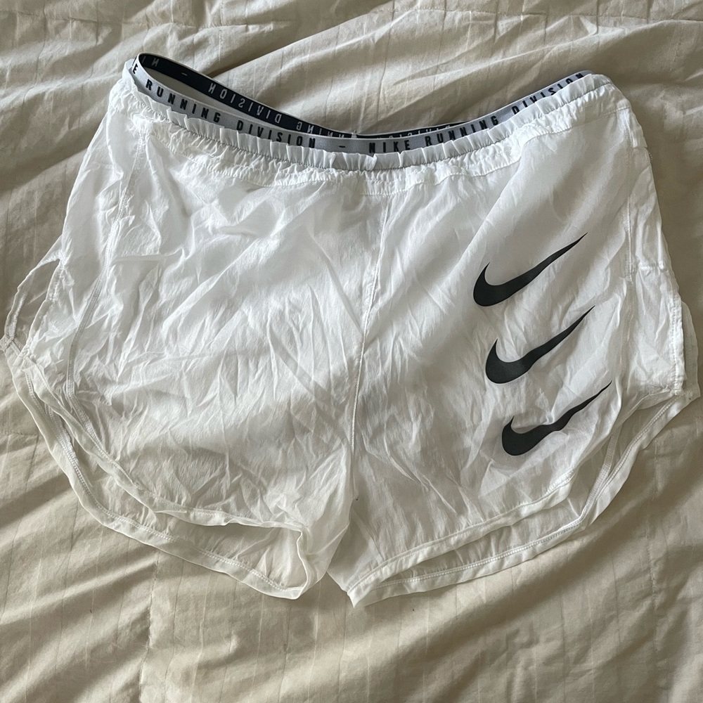 Nike Women's White Athletic Shorts with Black Swoosh